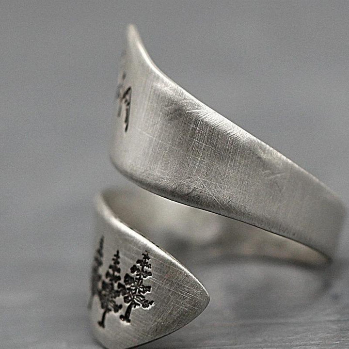 "Elegant silver Nature Art ring med justerbar design, med maskros och fjällmotiv, för män och kvinnor."