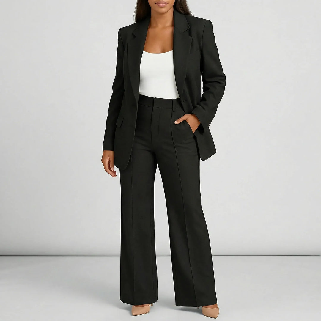 Lauren byxkostymset för dam: elegant skräddarsytt med högmidja och vidben. Perfekt för en professionell stil.