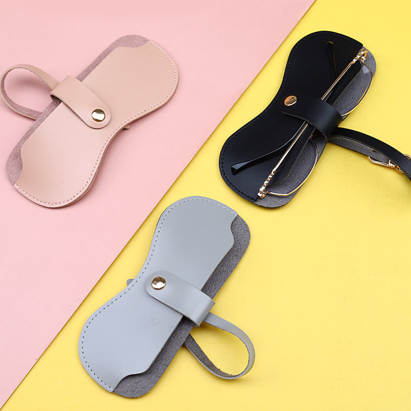 "Elegant solglasögonväska i mjukt PU-läder med metalltryckknapp, finns i rosa, svart, grå, vit, för damaccessoarer."