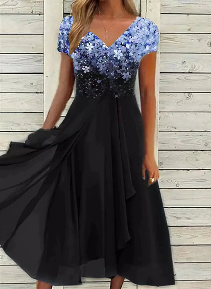 Elegant Soraya vår/sommarklänning för kvinnor, bekväm kortärmad midi perfekt för varma dagar.