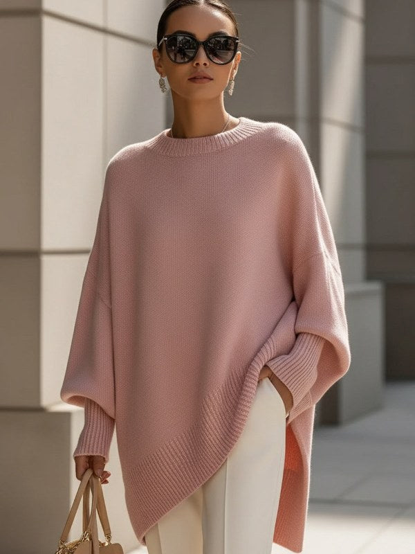 Trendig stickad damponcho för höstmode och vårkläder, elegant design med mysig oversize passform.