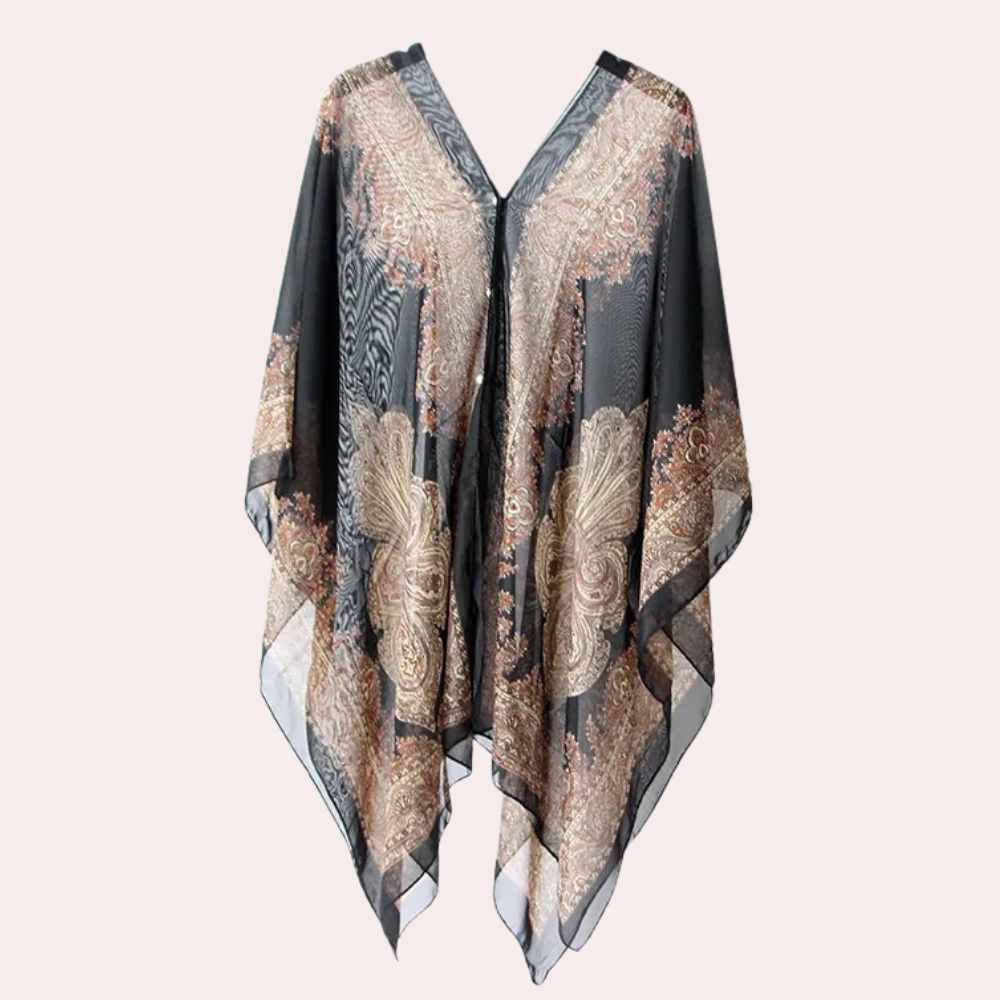Damponcho, svart och elegant, kan bäras som sjal. Mjukt material, perfekt för höst, vår och sommar.