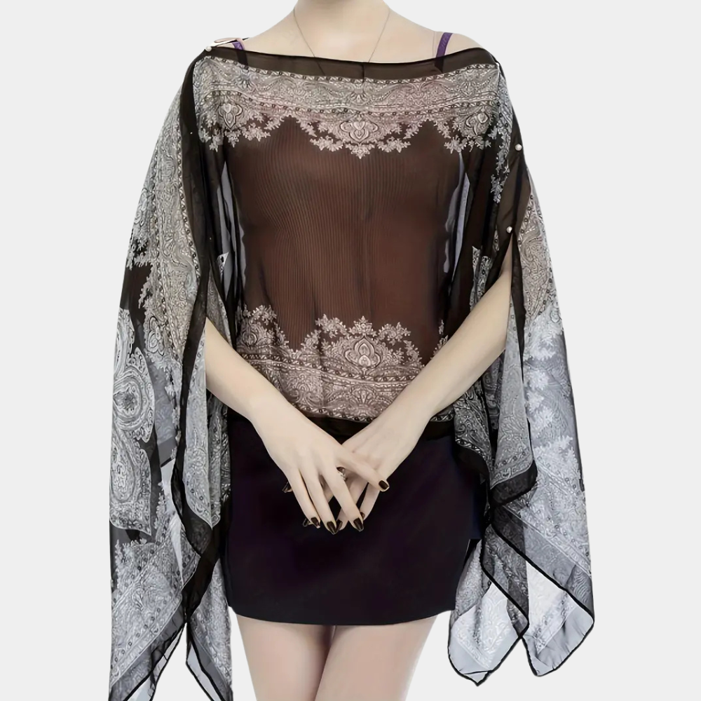 Stilfull svart damponcho/sjal, en storlek passar alla. Flödande fall, idealisk för höstmode och elegans.