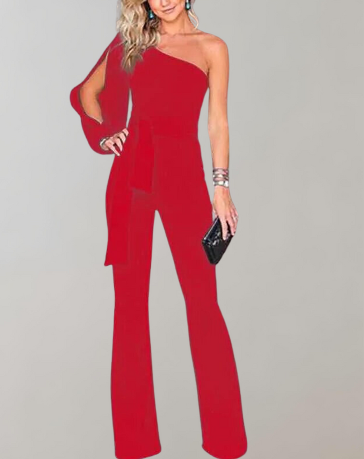 Kvinnlig byxdress med vida ben och ett elegant rosettbälte, perfekt för en kvällsoutfit.