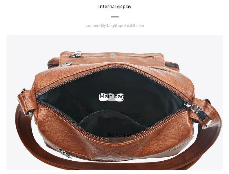 Trendig svart crossbodyväska för kvinnor, elegant och rymlig, handväska för outfit.