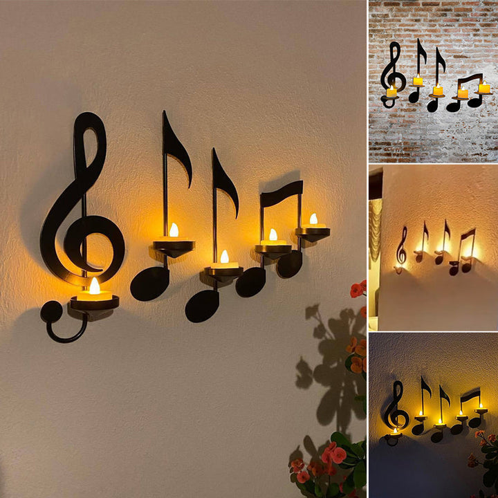 "Elegant svart metall väggmonterad musiknot ljusstake; kombinerar musikinspirerad design med stilfull dekoration."