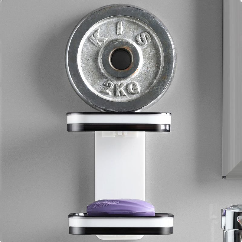 "Elegant svart och grå tvålkopp med avtappningsbricka, stilren design, glansig bakgrund, perfekt för badrumshylla."