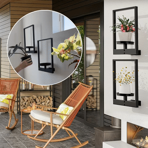 Elegant svart väggväxthållare i metall. Modern och platsbesparande design för stilfull växtinredning.