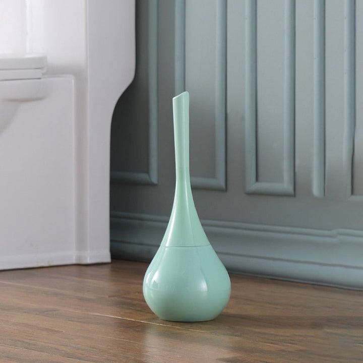 Trendig toalettborste med matchande hållare. Ett badrumstillbehör för inredning & hygien.