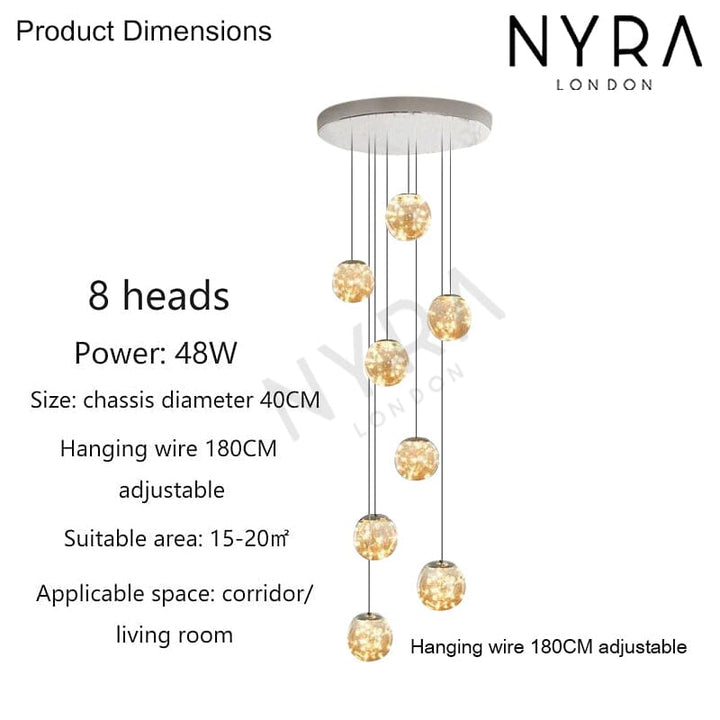 Trappkrona med modern LED-teknik och vackra glasglober, lyxig inredningsdetalj.