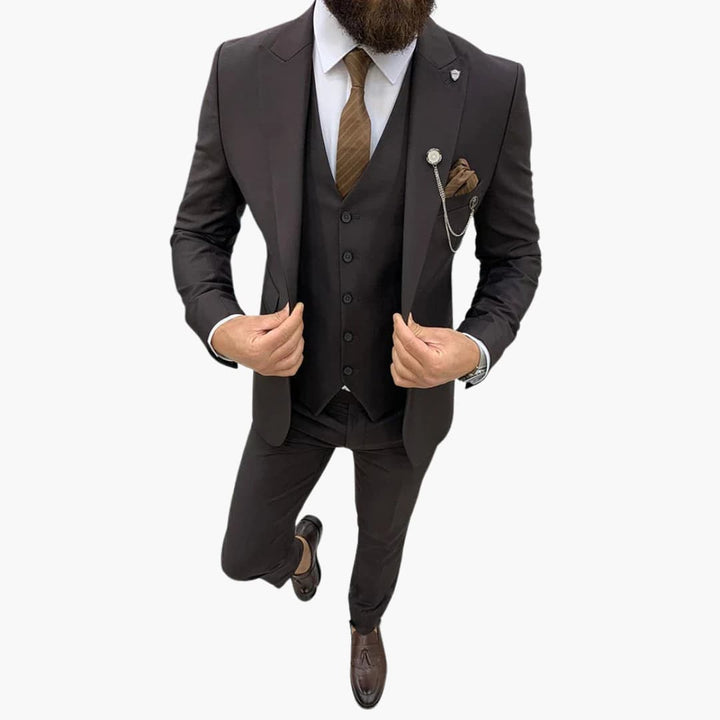 Elegant tredelad herrkostym i smal passform. Perfekt för bröllop och formella event.