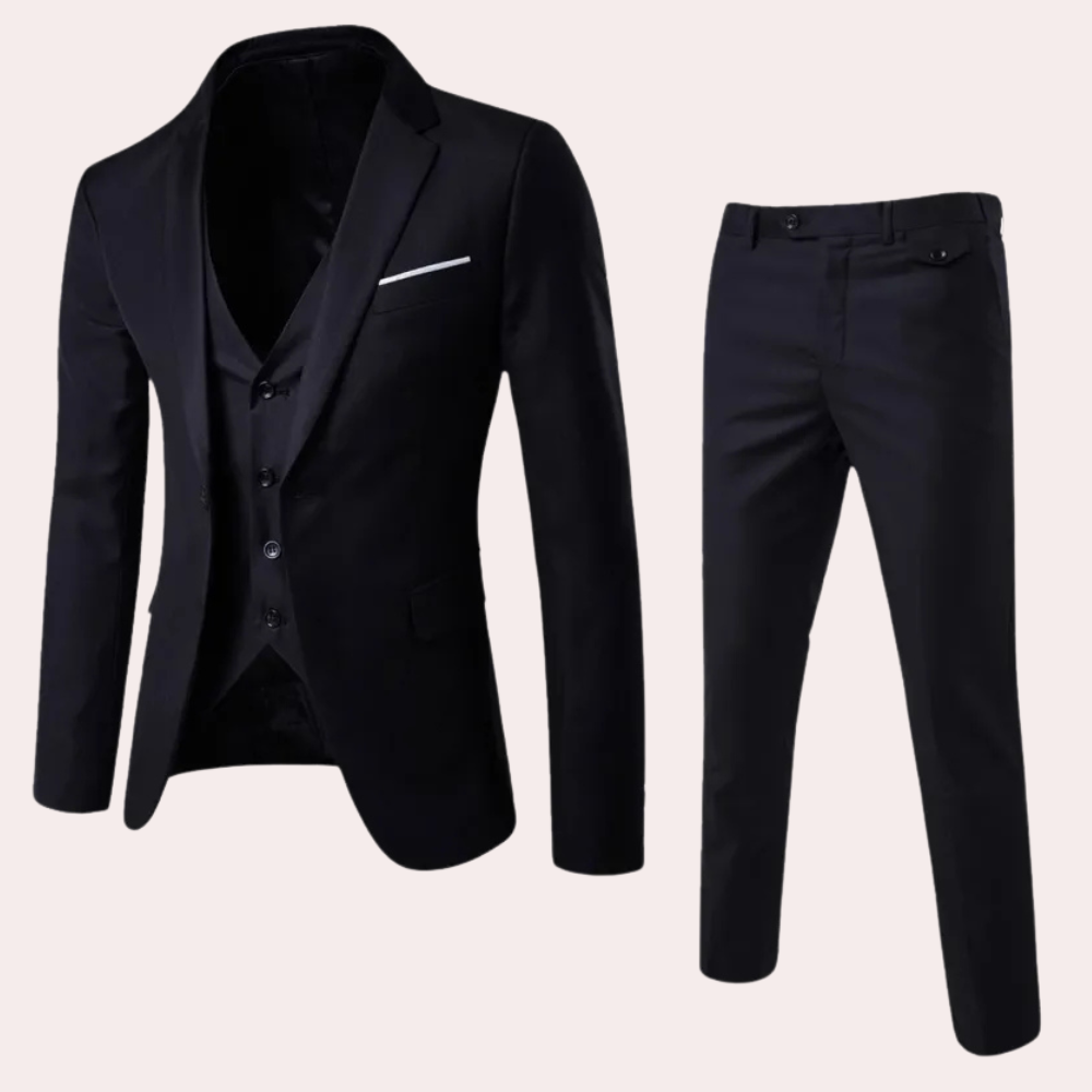 Elegant tredelad herrkostym Leon i slimfit. Perfekt för bröllop, affärsmöten och formella event.