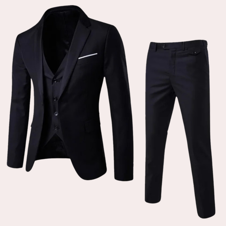 Elegant tredelad herrkostym Leon i slimfit. Perfekt för bröllop, affärsmöten och formella event.
