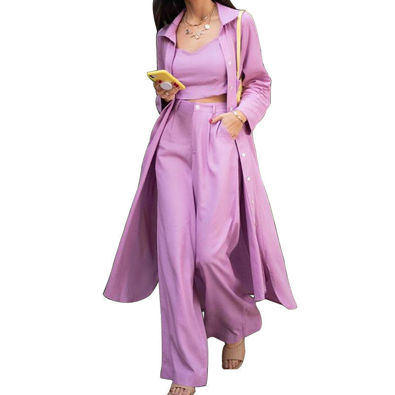 Elegant tredelad kvinnokostym i lila och svart, utsvängda byxor, stilfull design, perfekt för sommarens alla tillfällen.