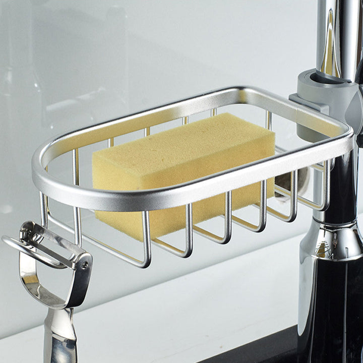 "Elegant tvålhållare i matt svart och silver, robust aluminium, för både kök och badrum, ger stil och organisation."