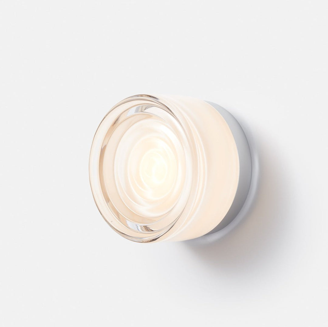 Väderbeständig LED vägglampa, modern stil för effektfull utomhusbelysning.