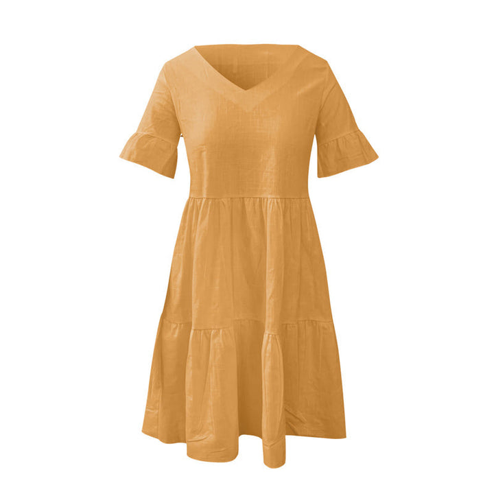 "Elegant V-ringad sommarklänning i mjukt nylon, vit färg. Perfekt för kvinnor, chic stil och ledig passform."