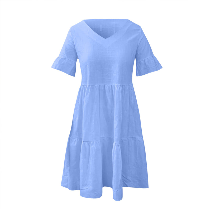 "Elegant V-ringad sommarklänning i mjukt nylon, vit färg. Perfekt för kvinnor, chic stil och ledig passform."