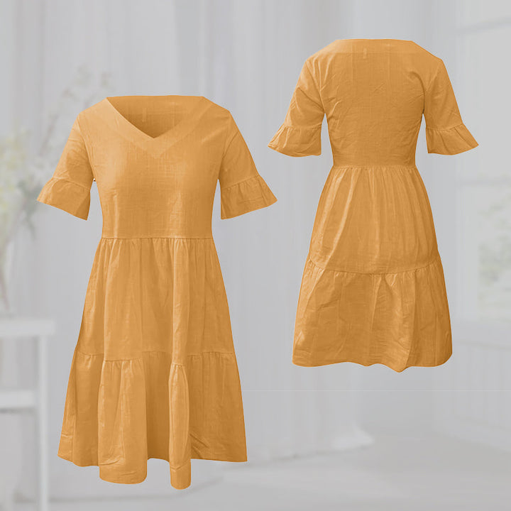 "Elegant V-ringad sommarklänning i mjukt nylon, vit färg. Perfekt för kvinnor, chic stil och ledig passform."