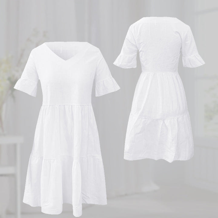 "Elegant V-ringad sommarklänning i mjukt nylon, vit färg. Perfekt för kvinnor, chic stil och ledig passform."