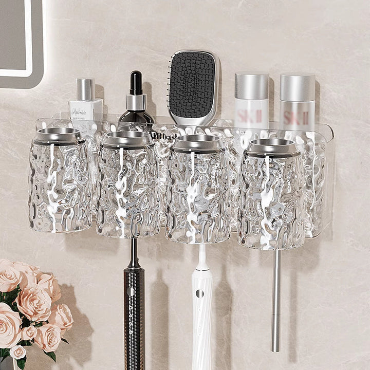 "Elegant väggmonterad tandborsthållare med munsköljkopp i silver/grå, sparar plats och håller badrummet organiserat."