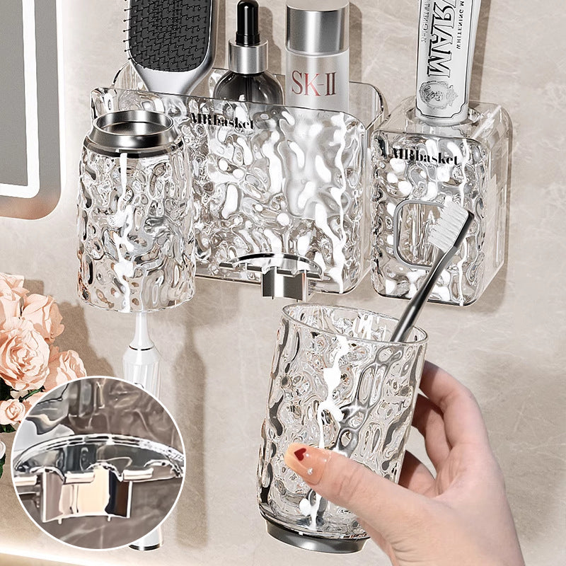 "Elegant väggmonterad tandborsthållare med munsköljkopp i silver/grå, sparar plats och håller badrummet organiserat."