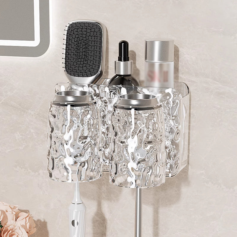 "Elegant väggmonterad tandborsthållare med munsköljkopp i silver/grå, sparar plats och håller badrummet organiserat."