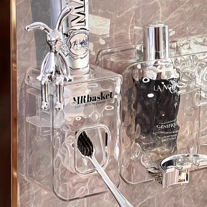 "Elegant väggmonterad tandborsthållare med munsköljkopp i silver/grå, sparar plats och håller badrummet organiserat."