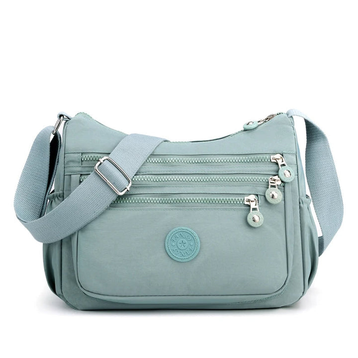 Vattentät axelremsväska för dam, elegant modeaccessoar. Messenger stil, perfekt för vardag.