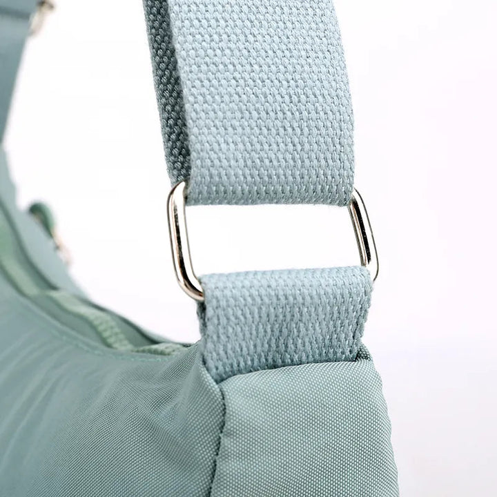Vattentät handväska för dam, elegant axelremsväska i messenger-stil.