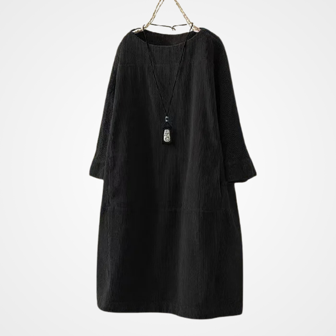 Elegant festklänning för kvinnor, vintage modell med rund hals och spetsdetaljer.