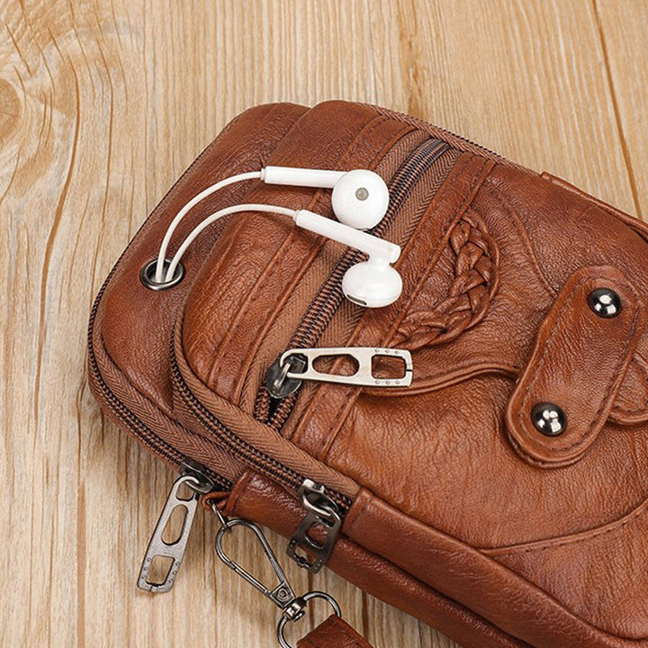 "Elegant vintage mini crossbody-väska i PU-läder, svart och kompakt, perfekt för kvinnor som söker stil och funktion."