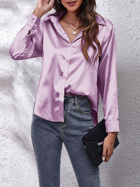 Mångsidig kvinnors blus med långa ärmar, lätt att kombinera med olika outfits.