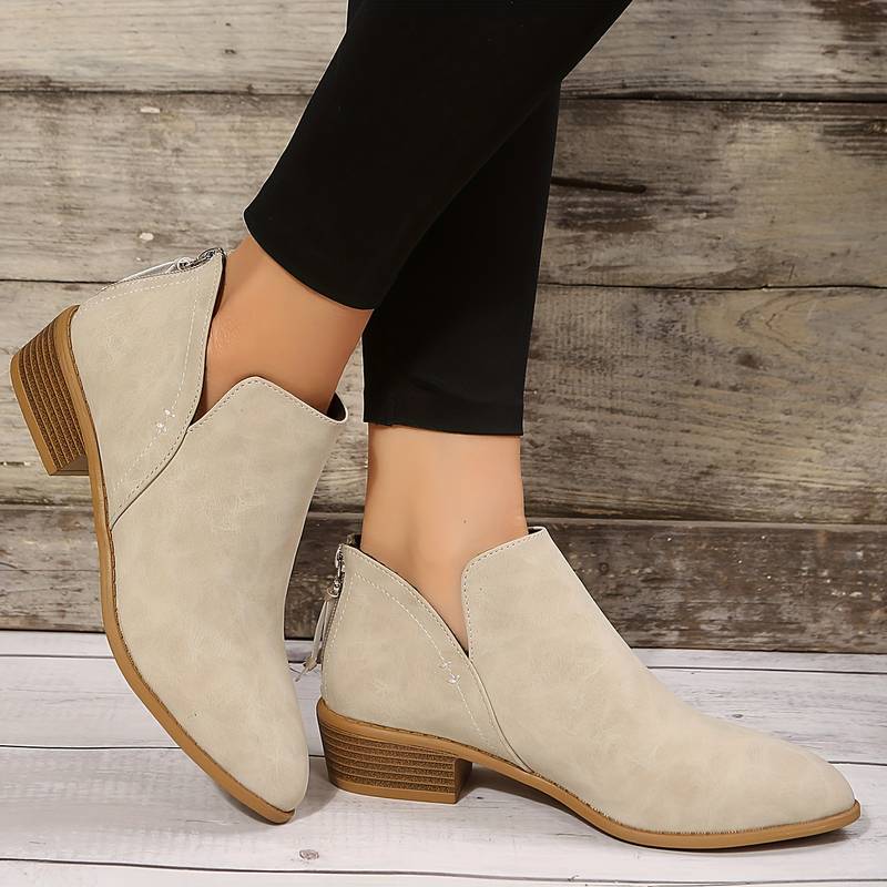 Stilrena och bekväma ankelstövlar i beige, mångsidiga damboots för mode och komfort.