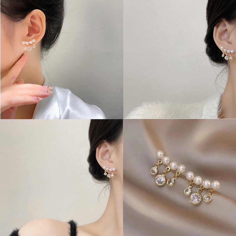 Eleganta böjda pärltofs örhängen för kvinnor i sterling silver, vita pärlor, modern design, nickelfri, glamourös look.