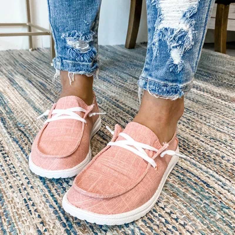 "Eleganta dam sneakers i grå canvas med minnesskum, rund tå och medelhög klack, perfekt för stil och komfort."