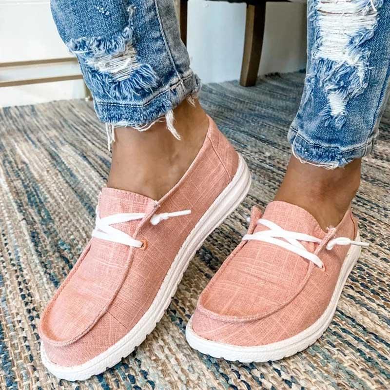 "Eleganta dam sneakers i grå canvas med minnesskum, rund tå och medelhög klack, perfekt för stil och komfort."