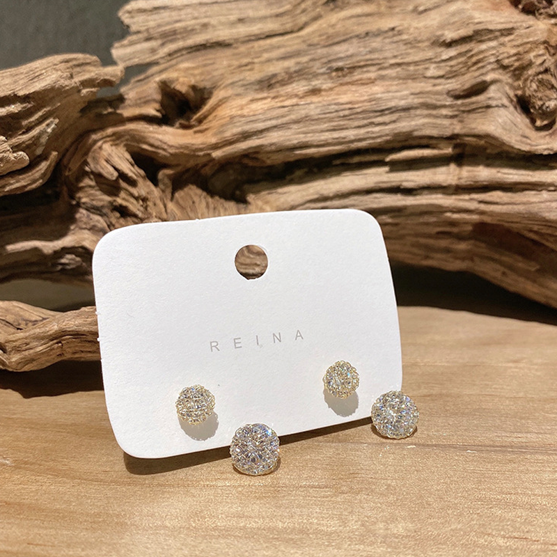 "Eleganta damörhängen med hängande zirkon i koppar, unik modern design, perfekt för stil och glans vid alla tillfällen."