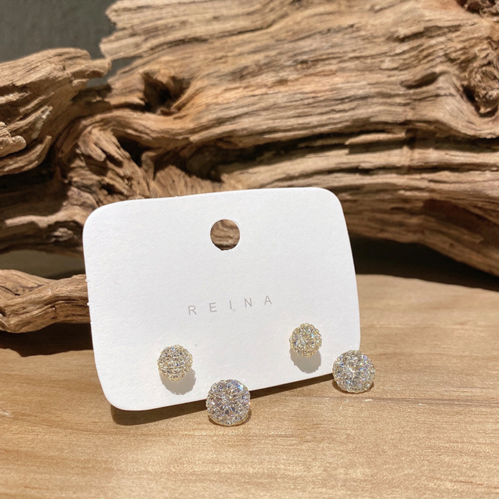 "Eleganta damörhängen med hängande zirkon i koppar, unik modern design, perfekt för stil och glans vid alla tillfällen."