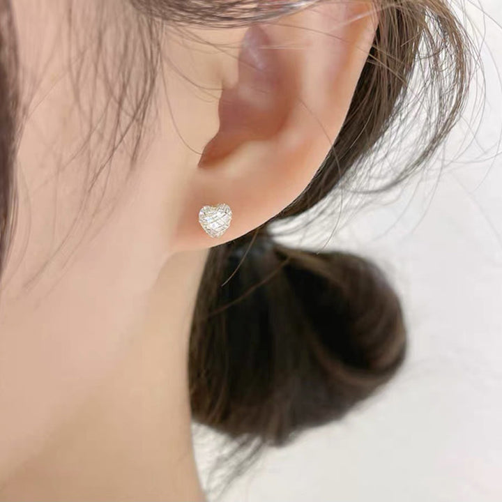 "Eleganta damörhängen med hängande zirkon i koppar, unik modern design, perfekt för stil och glans vid alla tillfällen."