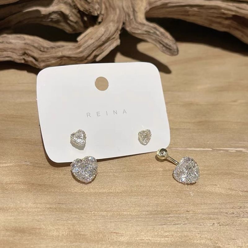 "Eleganta damörhängen med hängande zirkon i koppar, unik modern design, perfekt för stil och glans vid alla tillfällen."