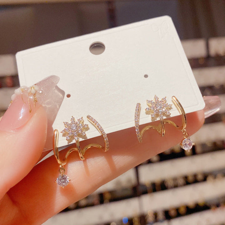 "Eleganta guldpläterade damörhängen med gnistrande zirkon, perfekt accessoar för stil och sofistikering."