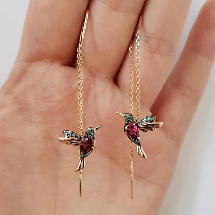 "Eleganta kolibriörhängen med blå zirkon, symbolisk design för kvinnor, lättviktiga och glänsande accessoarer."