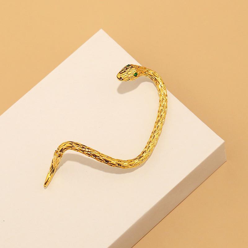 "Eleganta serpentin zirkon örhängen i svart guldpläterad legering, stilfullt designade för män och kvinnor."