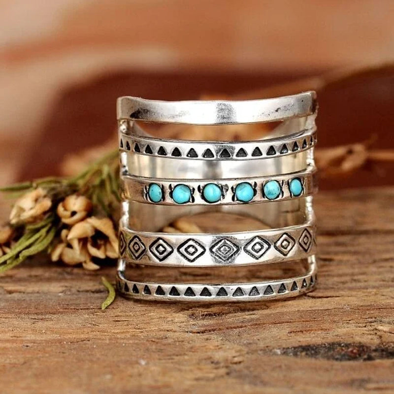 "Eleganta silver damring med stjärna, måne och sol-design, perfekt accessoar med glänsande yta för daglig användning."