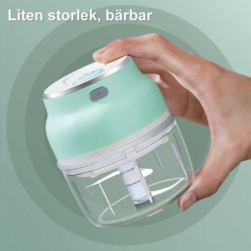 "Elektrisk bärbar minihakare för köket i kompakt design, med vassa stålblad och USB-laddning för enkel hackning"