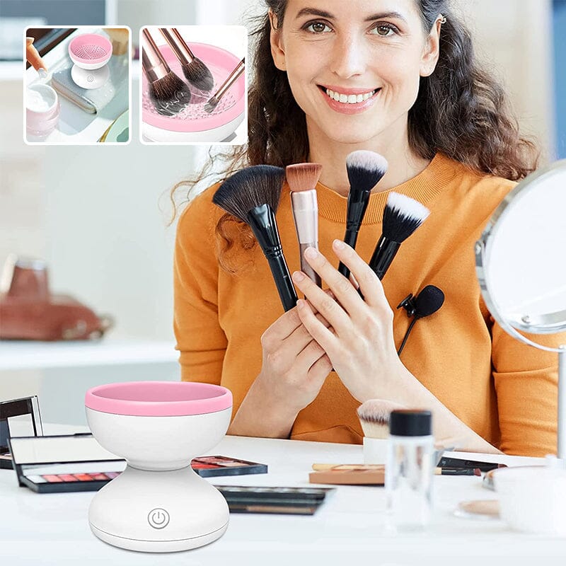 "Elektrisk makeupborstrengörare i rosa, kompakt med rund design, perfekt för effektiv borstvård på resor."
