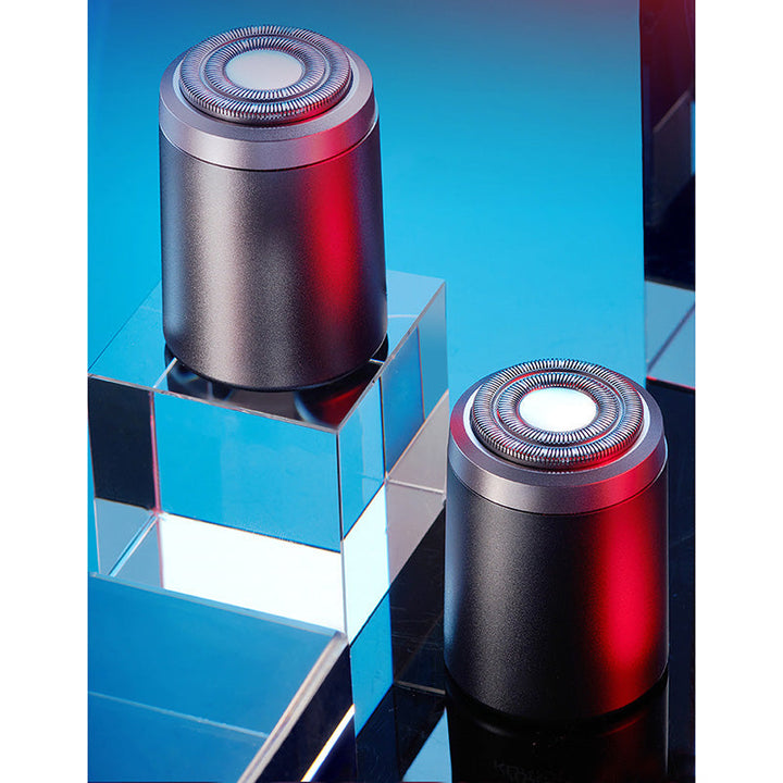 "Elektrisk minirakapparat för män, kompakt design, IPX7 vattentät med 25 blad för effektiv rakning, aluminiumlegering."