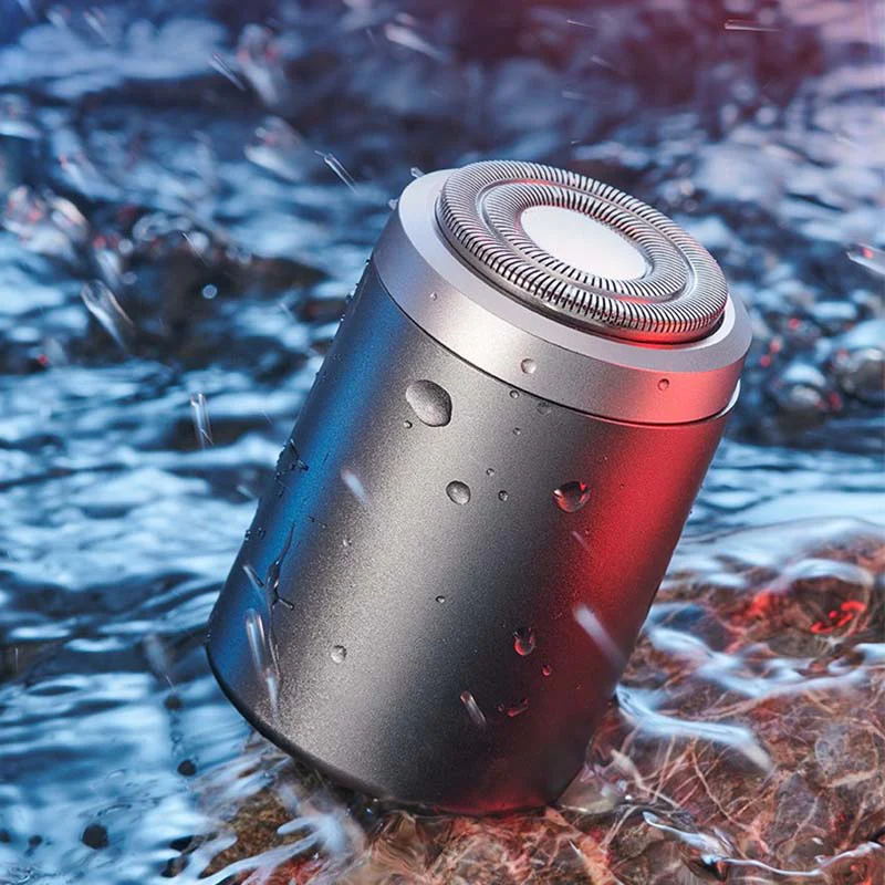"Elektrisk minirakapparat för män, kompakt design, IPX7 vattentät med 25 blad för effektiv rakning, aluminiumlegering."