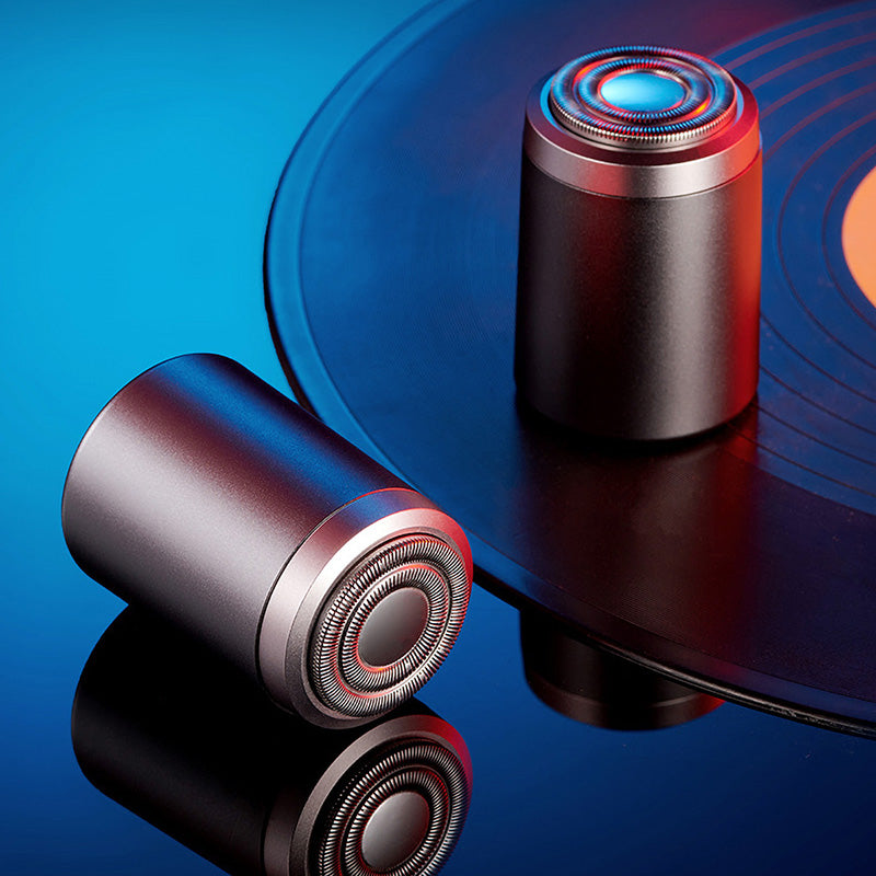 "Elektrisk minirakapparat för män, kompakt design, IPX7 vattentät med 25 blad för effektiv rakning, aluminiumlegering."